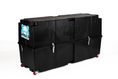 Load image into Gallery viewer, Vault Pro bike box closed, three-quarter view, showing the two latches along the seam and the red wheels at one end.