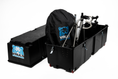 Load image into Gallery viewer, Vault Pro open beside its lid, packed with a bike and a Vault wheel bag.
