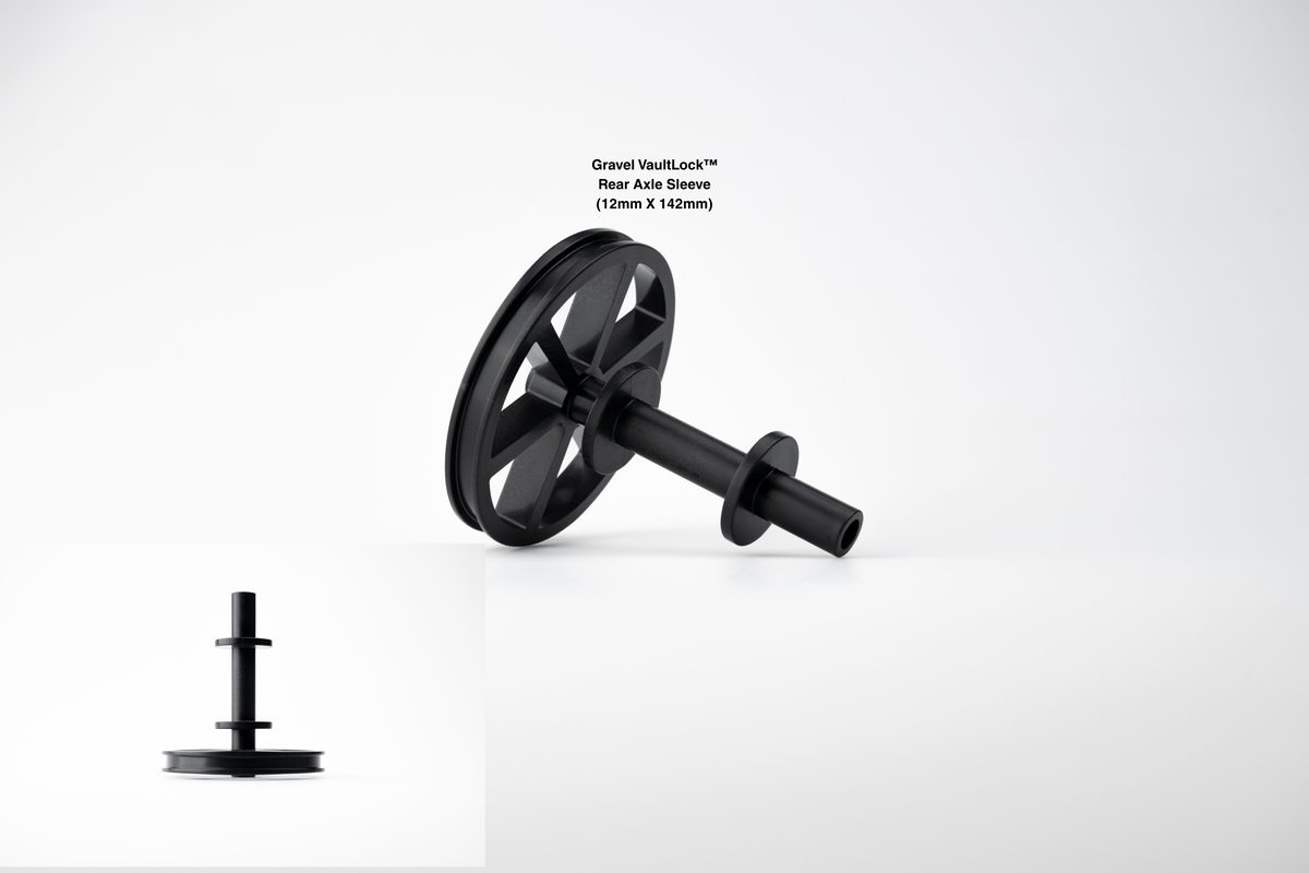 VaultLock rear axle sleeve for gravel bikes, a black sleeve with a splined disc, shown with its retaining bolt.
