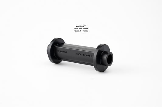 VaultLock front axle sleeve, a black cylinder with a shouldered cap at each end, for 12 by 100 millimetre thru-axles.