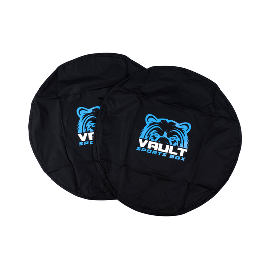 A pair of black Vault Sports Box wheel bags, overlapping, each carrying the Vault bear logo.