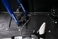 Load image into Gallery viewer, Close-up inside the case: the fork of a blue bike mounted on the VaultLock front adapter.

