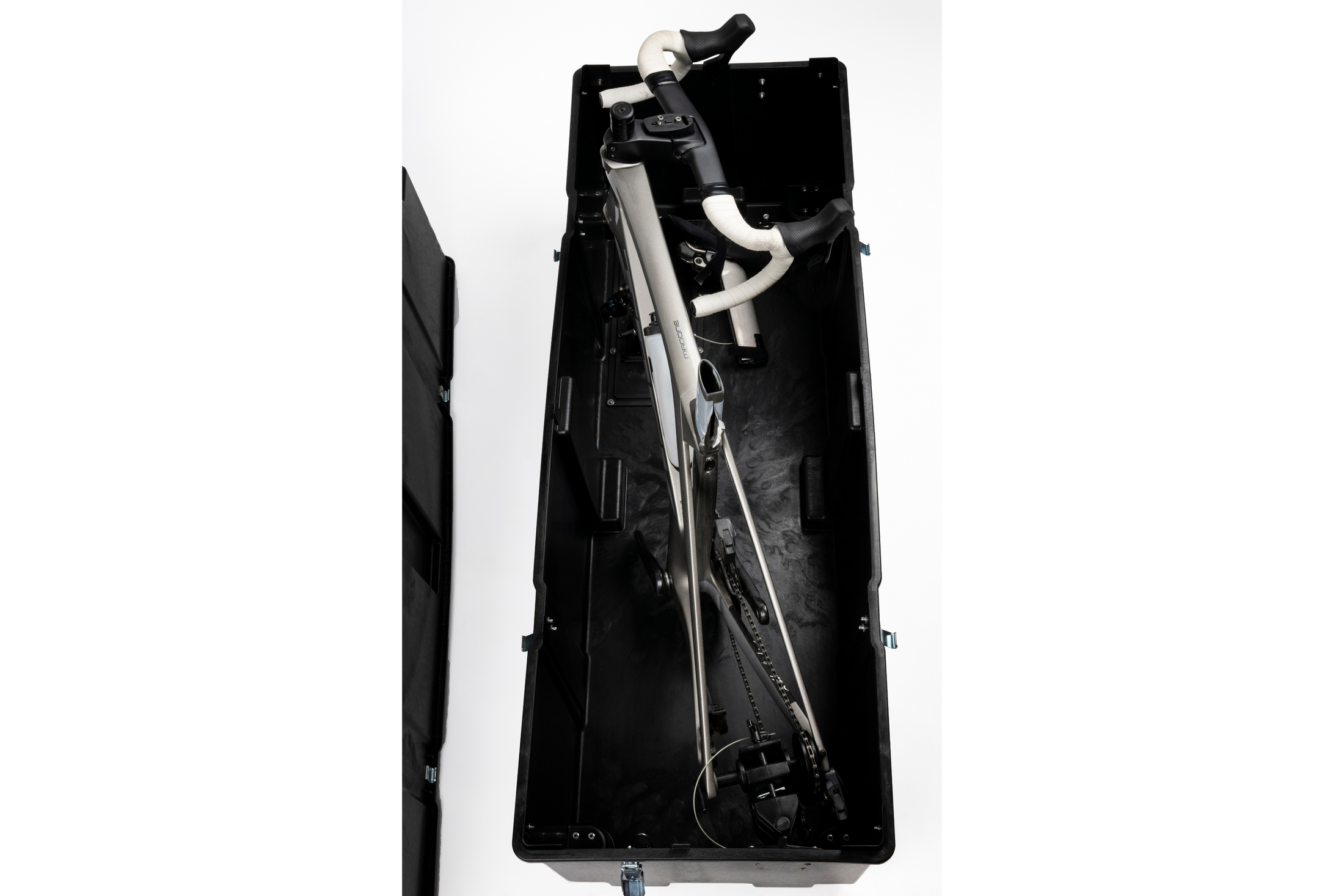 Overhead view of the open Vault Pro with a bike frame and forks laid inside.